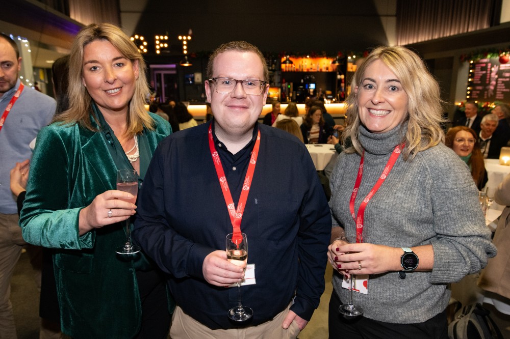 staff at a reception in the QFT foyer ahead of the screening of 'Delivering the Impossible: Agreement Twenty Five' documentary, 5 December 2023.