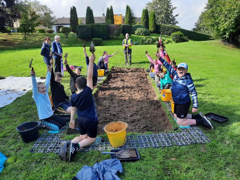 Students participating in an archaeological excavation at Lisdoo