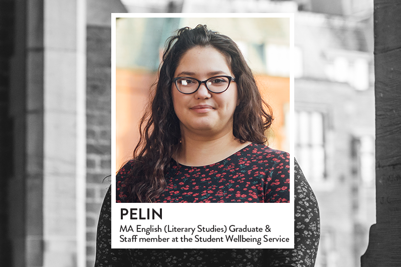 Image of staff member in cloisters of the quadrangle of Lanyon Building