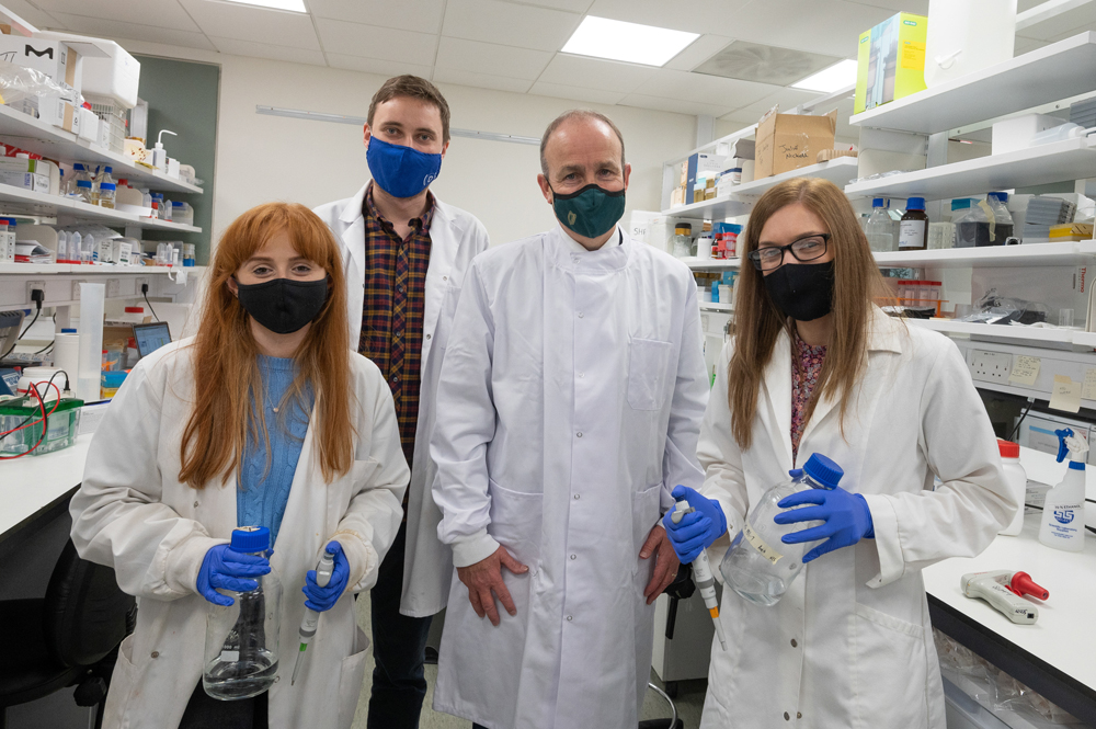 Taoiseach Micheal Martin visits Queen's Unviversity Belfast - with Cancer Centre staff and students