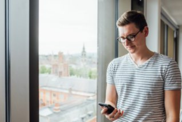 male student on phone