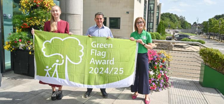 l-r Rachel Vaughan, Paul Wallace (QUB), Carol Forster (Keep Northern Ireland Beautiful) at the Green Flag Awards 2024-25 outside the Lagan Valley Island conference centre