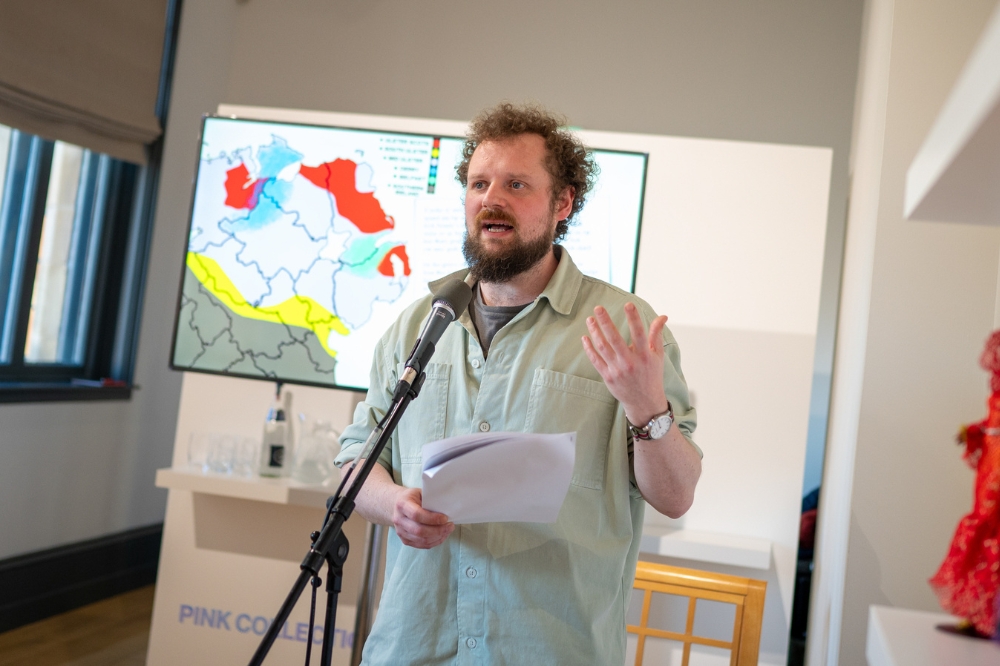 Dr Scott McKendry speaking at the launch of Queen's new Staff Network for Promoting Linguistic Diversity and Minority Languages, in the Naughton Gallery