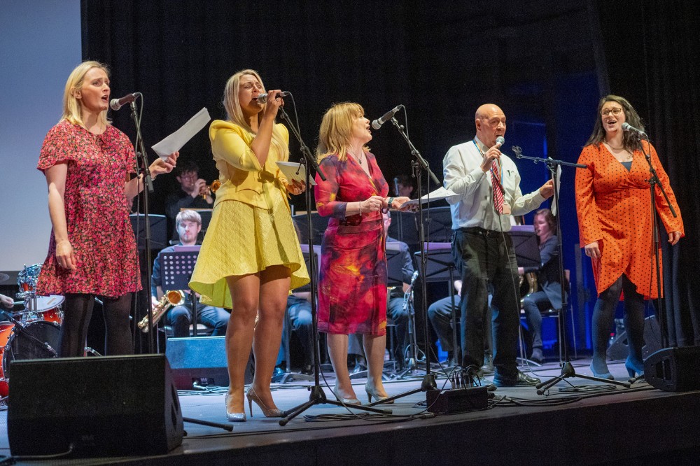 group of staff members singing at the Staff Excellence Awards 2022-23