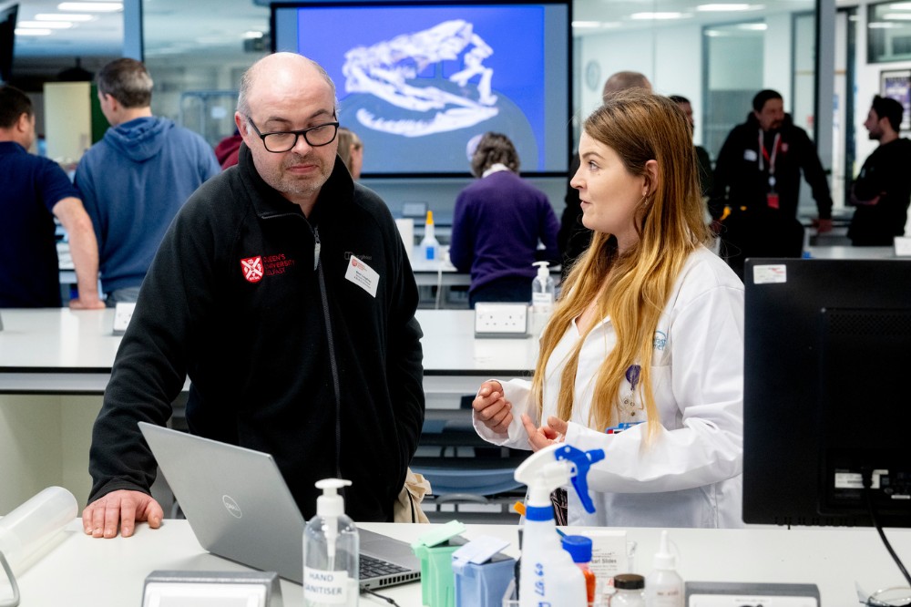 female technician explaining something to an event attendee at the Technician Showcase 2024